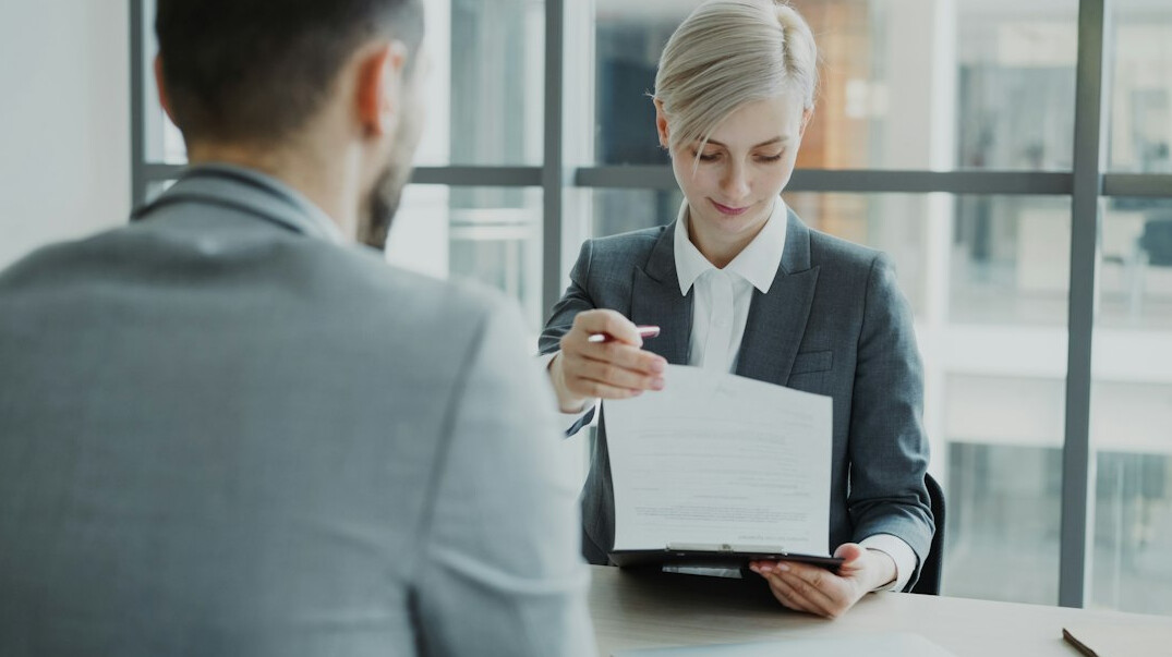 insurance agent with client